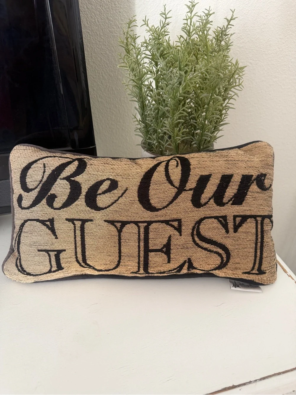 Disney Be Our  Guest Burlap Accent Pillow - Neutral Black Text